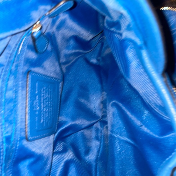 The Coach Edie bag soft slouchy silhouette style with functional design. - Picture 12 of 13